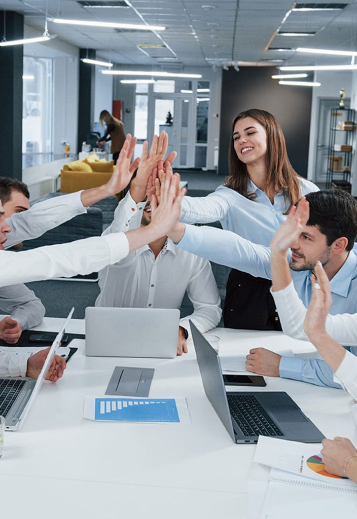 cheerful-business-people-job-is-done-group-office-workers-happy-hit-their-own-records-being-successful-704x1024