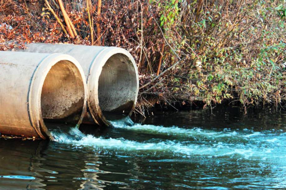 Discharge of sewage into a river