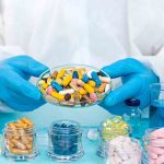 examine drugs in the laboratory. Selective focus. pills.