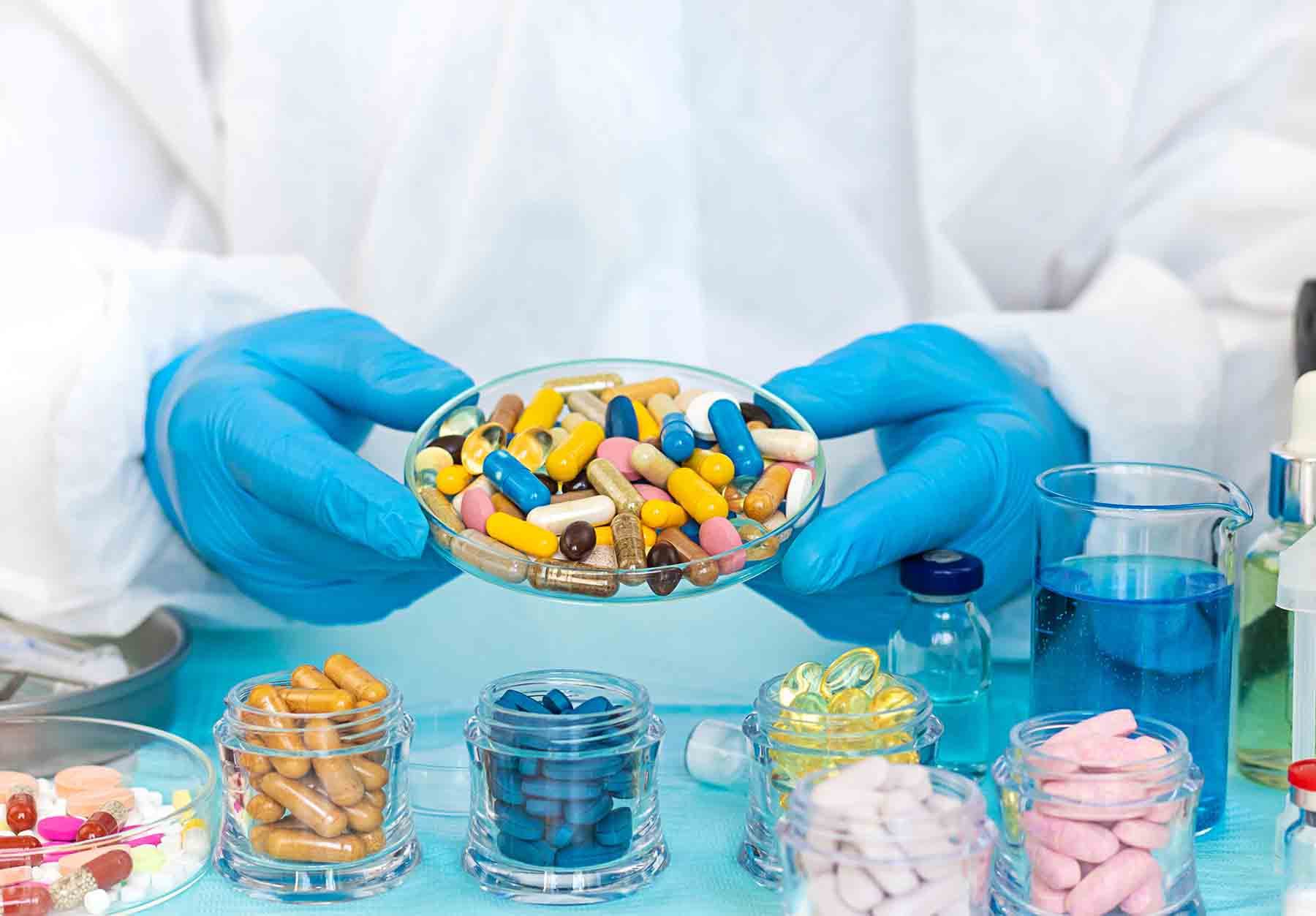 examine drugs in the laboratory. Selective focus. pills.